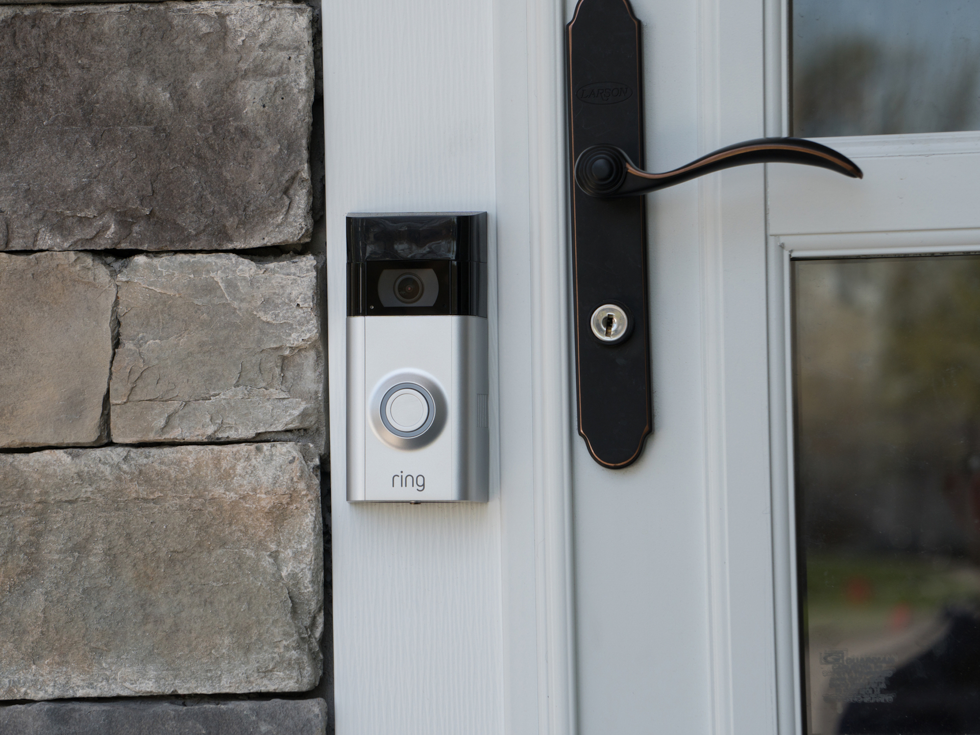 Amazon Ring security doorbell camera installed next to front door