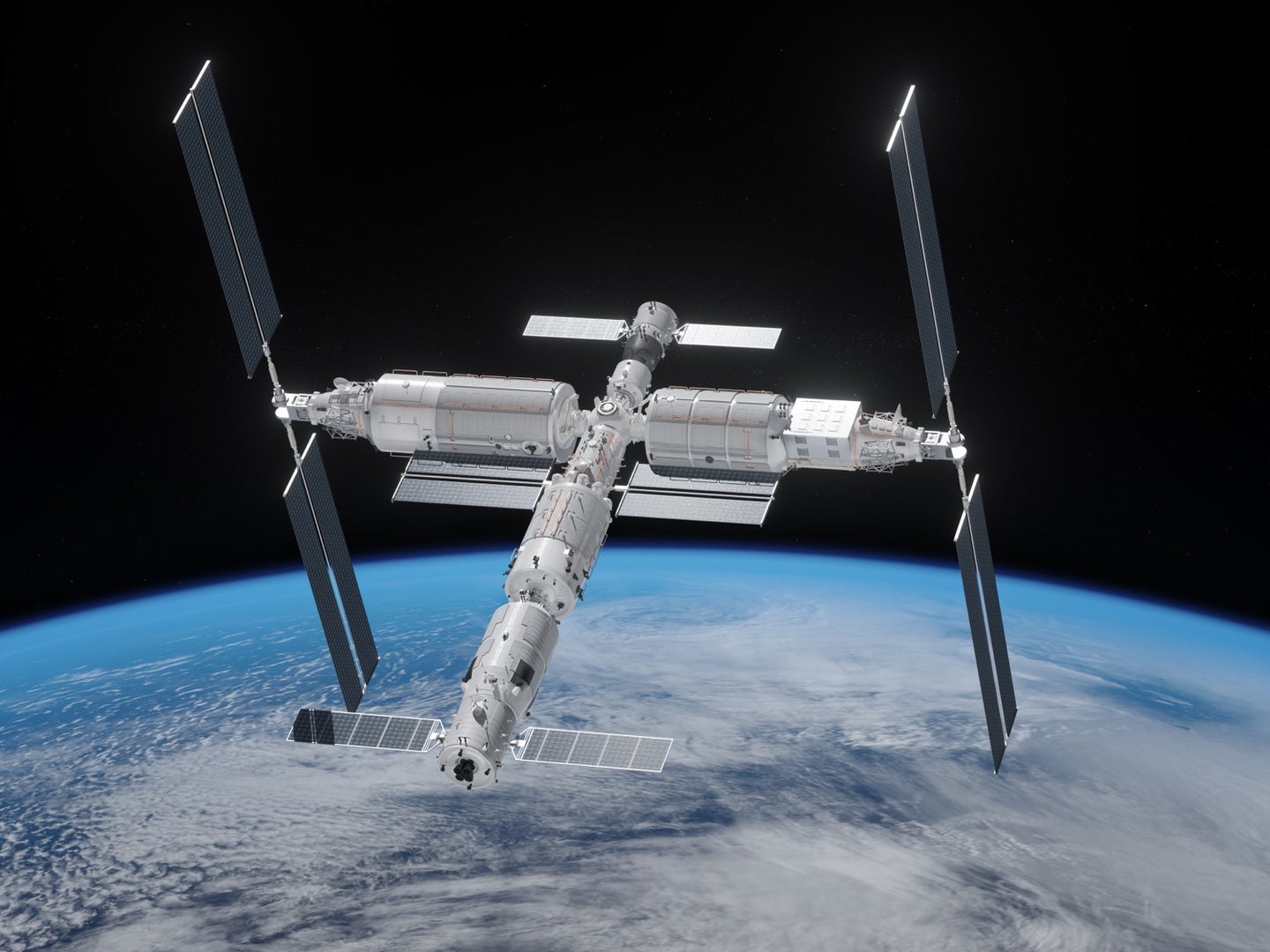 a t-shaped module space station in orbit above the earth