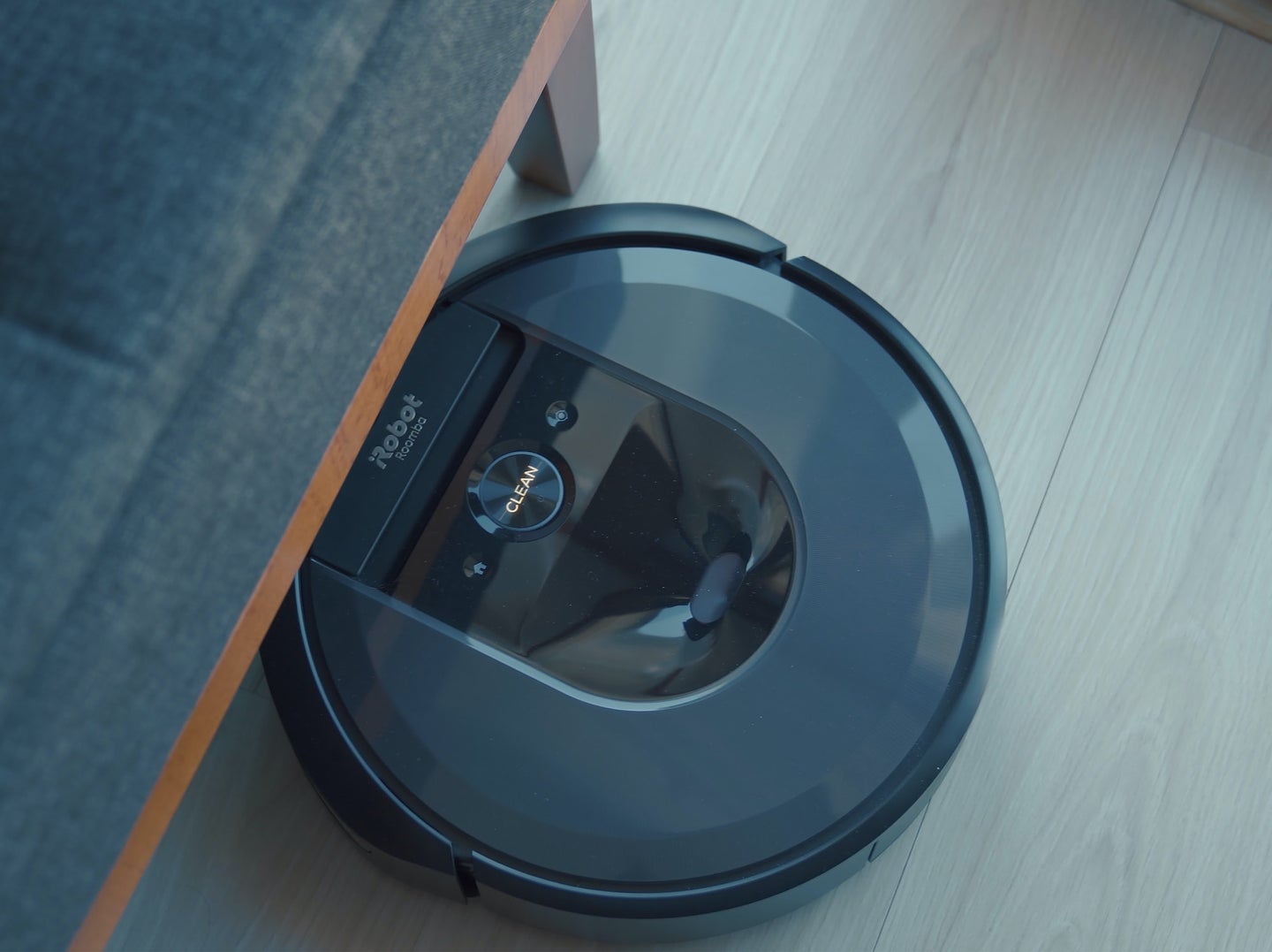 iRobot Roomba vacuum going underneath couch