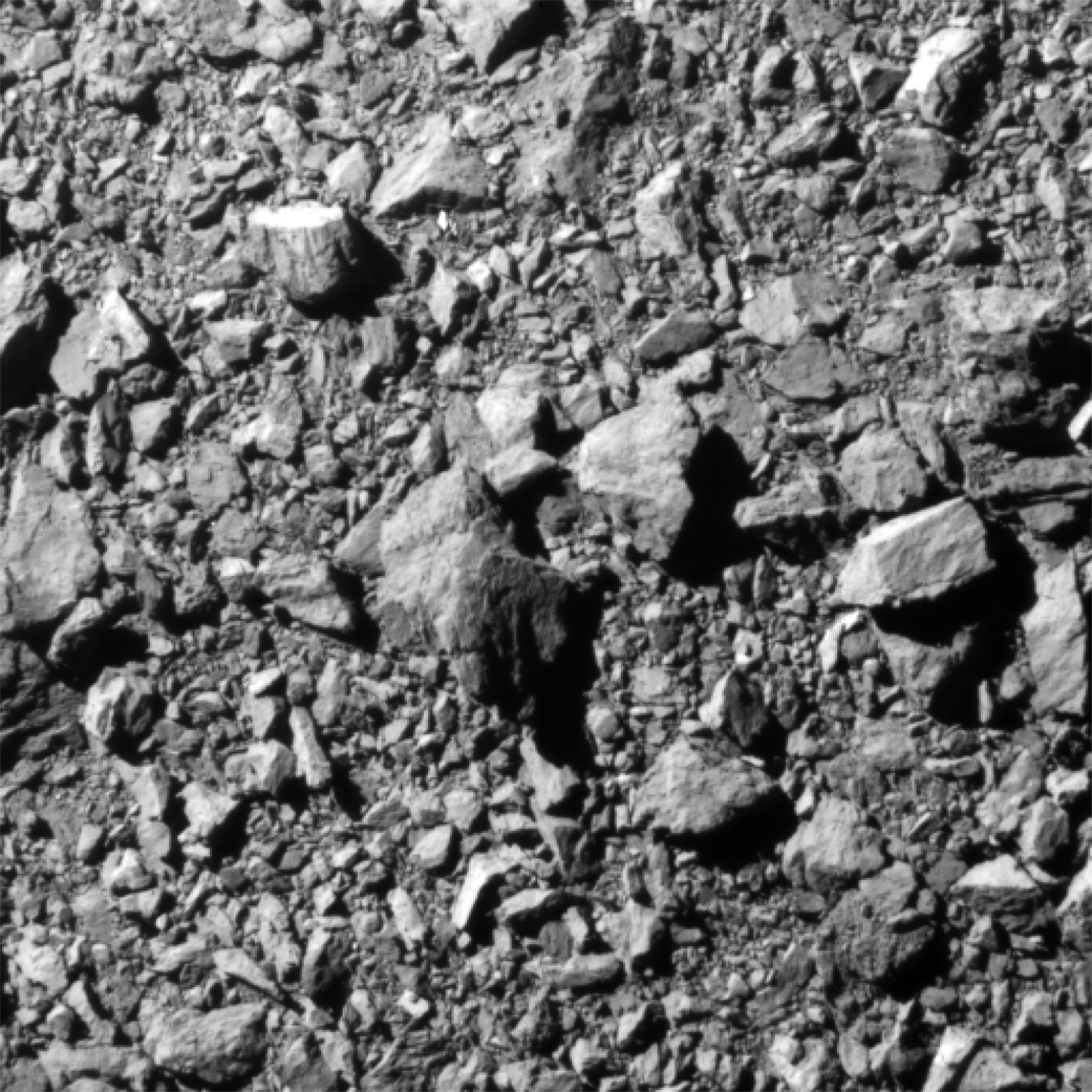 gray gravel on the surface of the asteroid