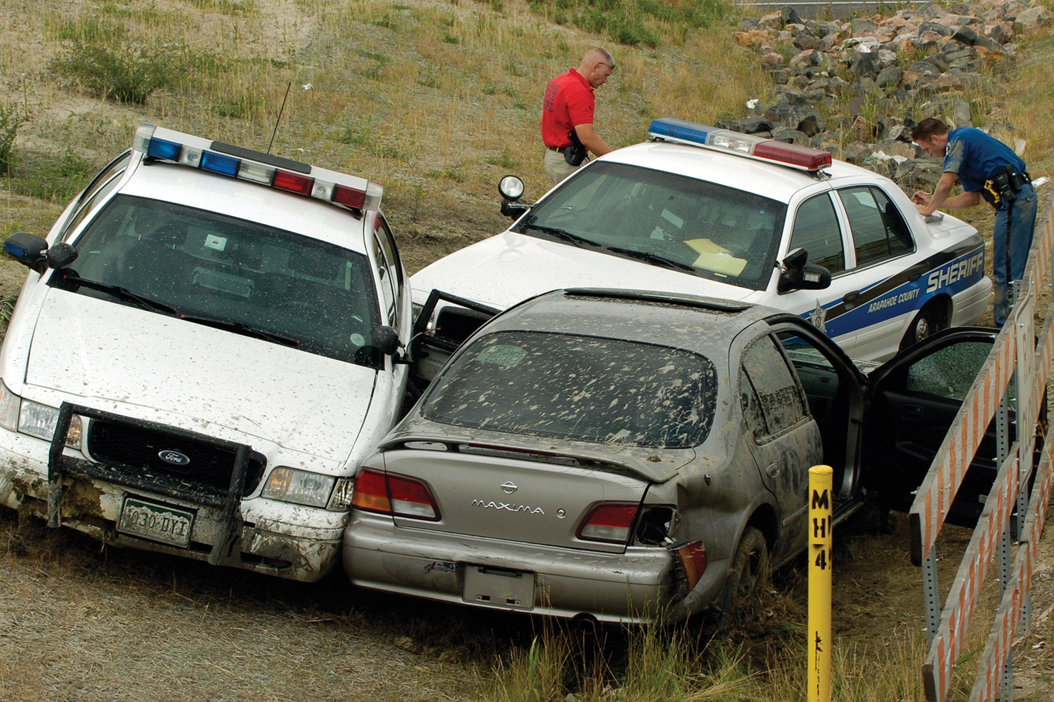 <b>2005:</b> Boxing in this Colorado driver was no easy task. Even at 100 miles an hour, he still managed to open fire at the cops on his tail.