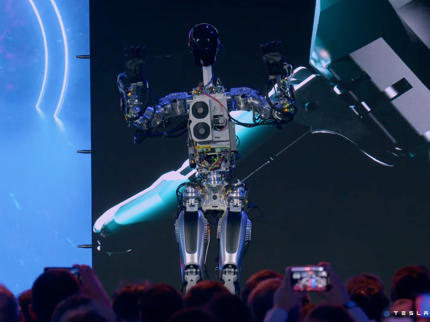 Tesla Optimus robot prototype dancing on stage