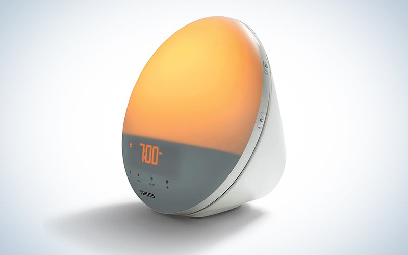 The Philips SmartSleep Wake-up Light on a blue and white background