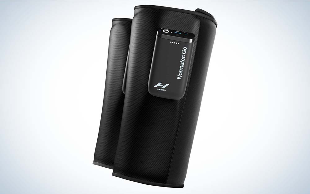 A black Hyperice Normatec Go, a battery-powered device that runners can use to help their muscles recover.