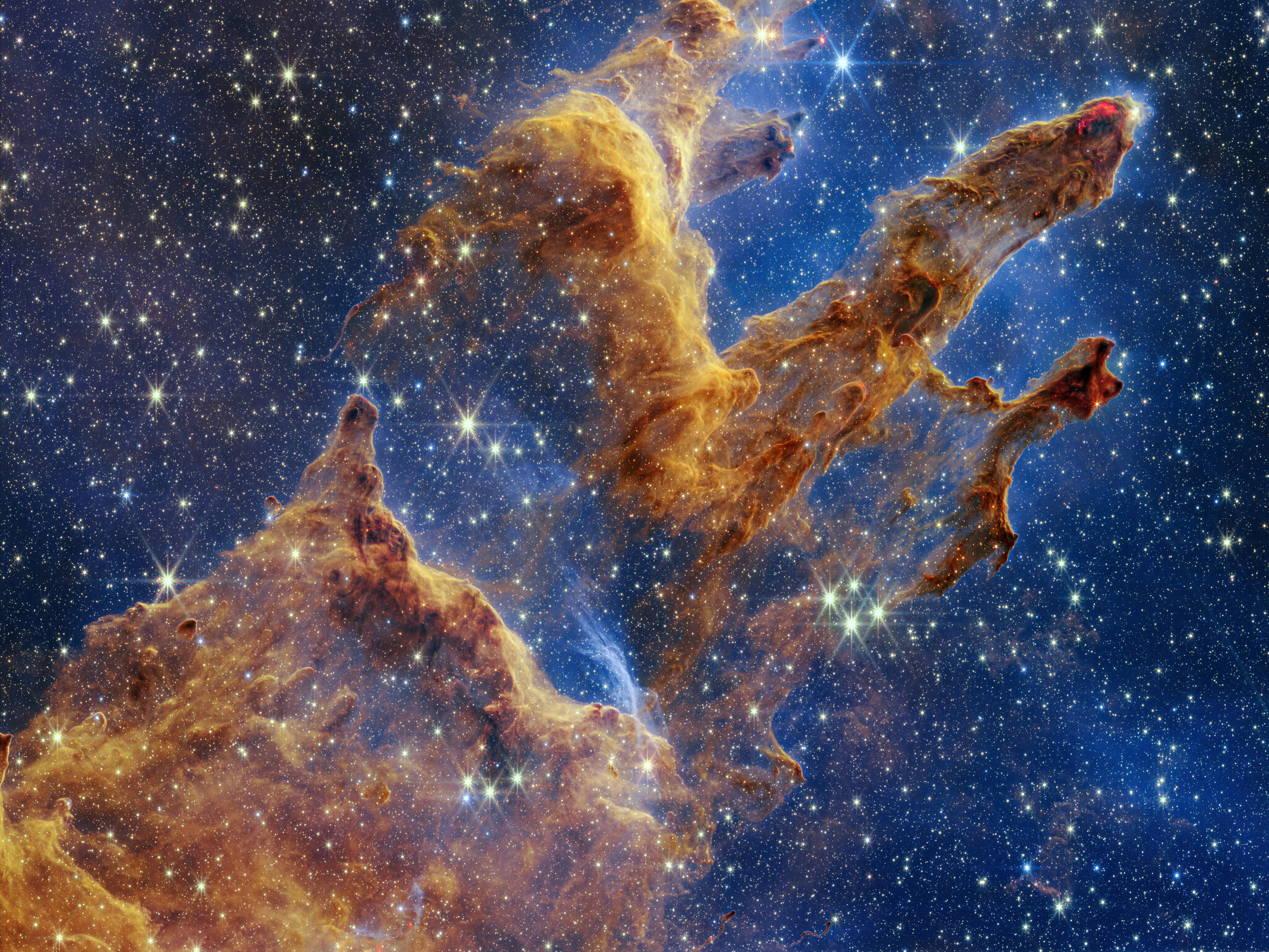 Webb telescope shows explosion of stars in the Pillars of Creation ...