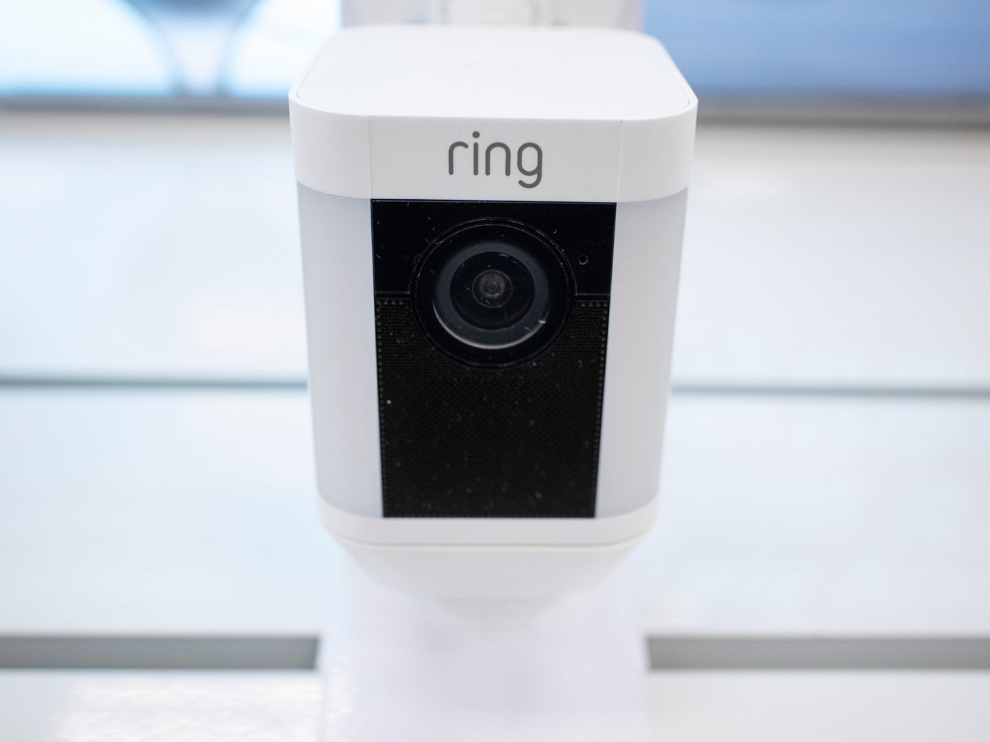 Close up of Amazon Ring security camera mounted outside building
