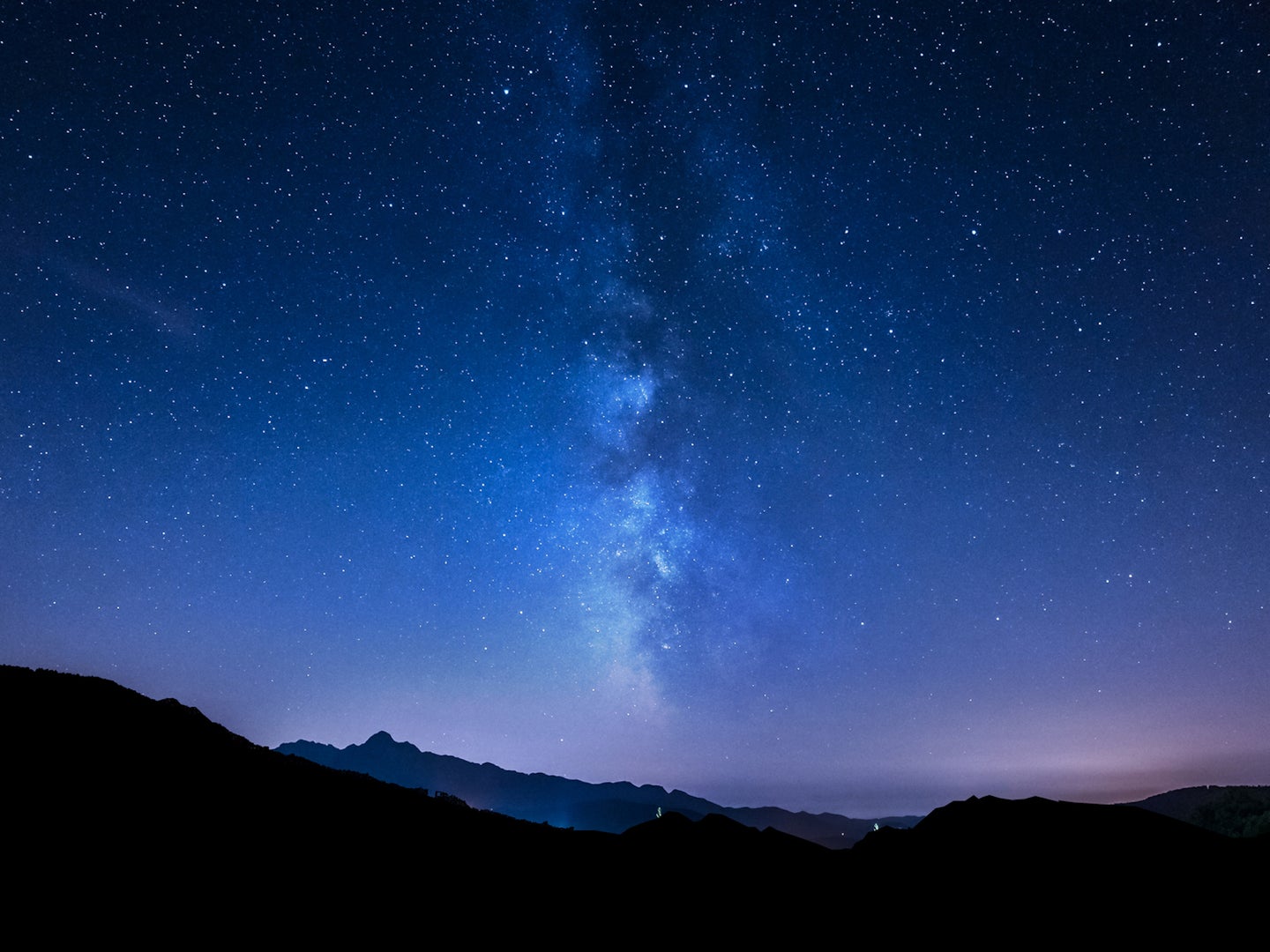 night sky stars and Milky Way above mountain background