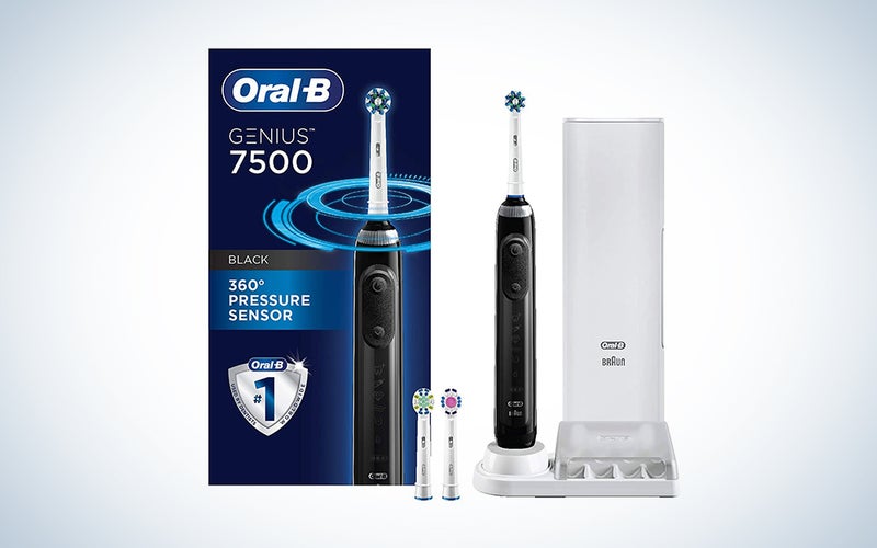 An Oral-B Genius 7500 system on a blue and white background
