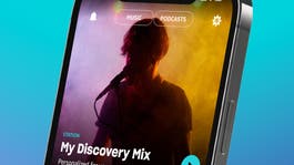Phone with Amazon Music homepage displayed on screen
