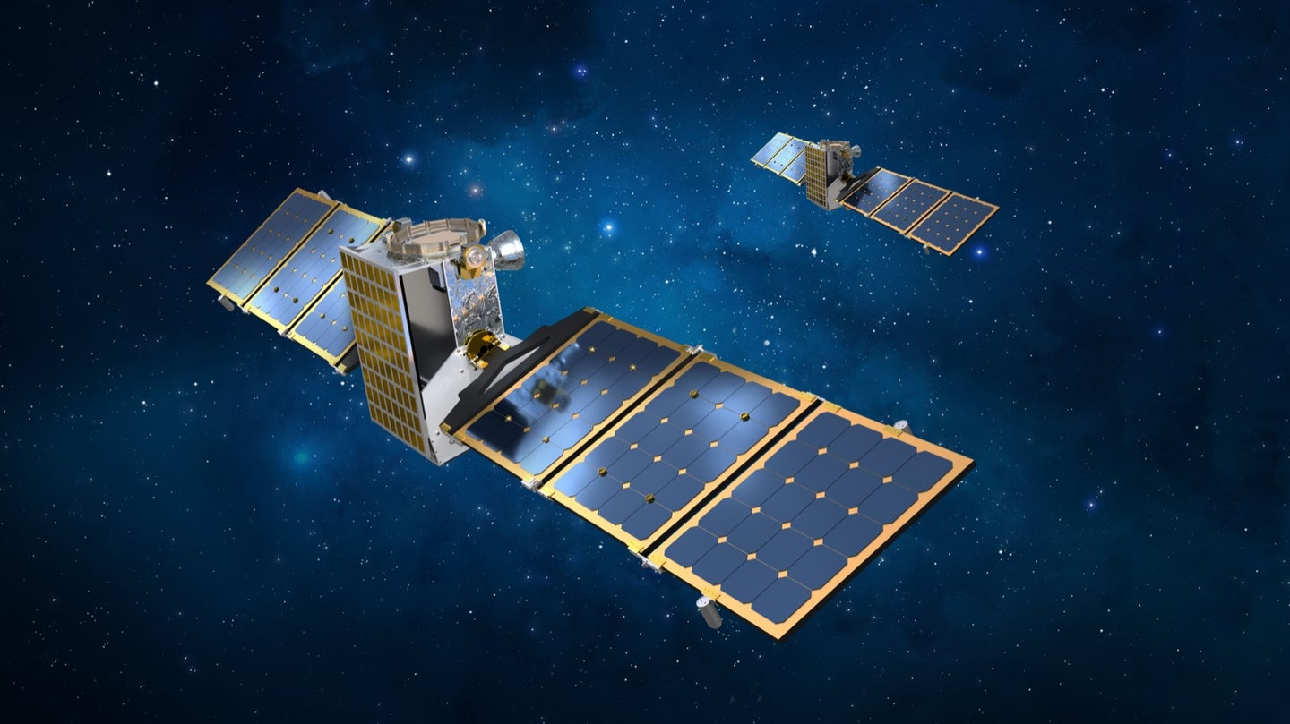 illustration of two cube satellites with solar panels floating in space