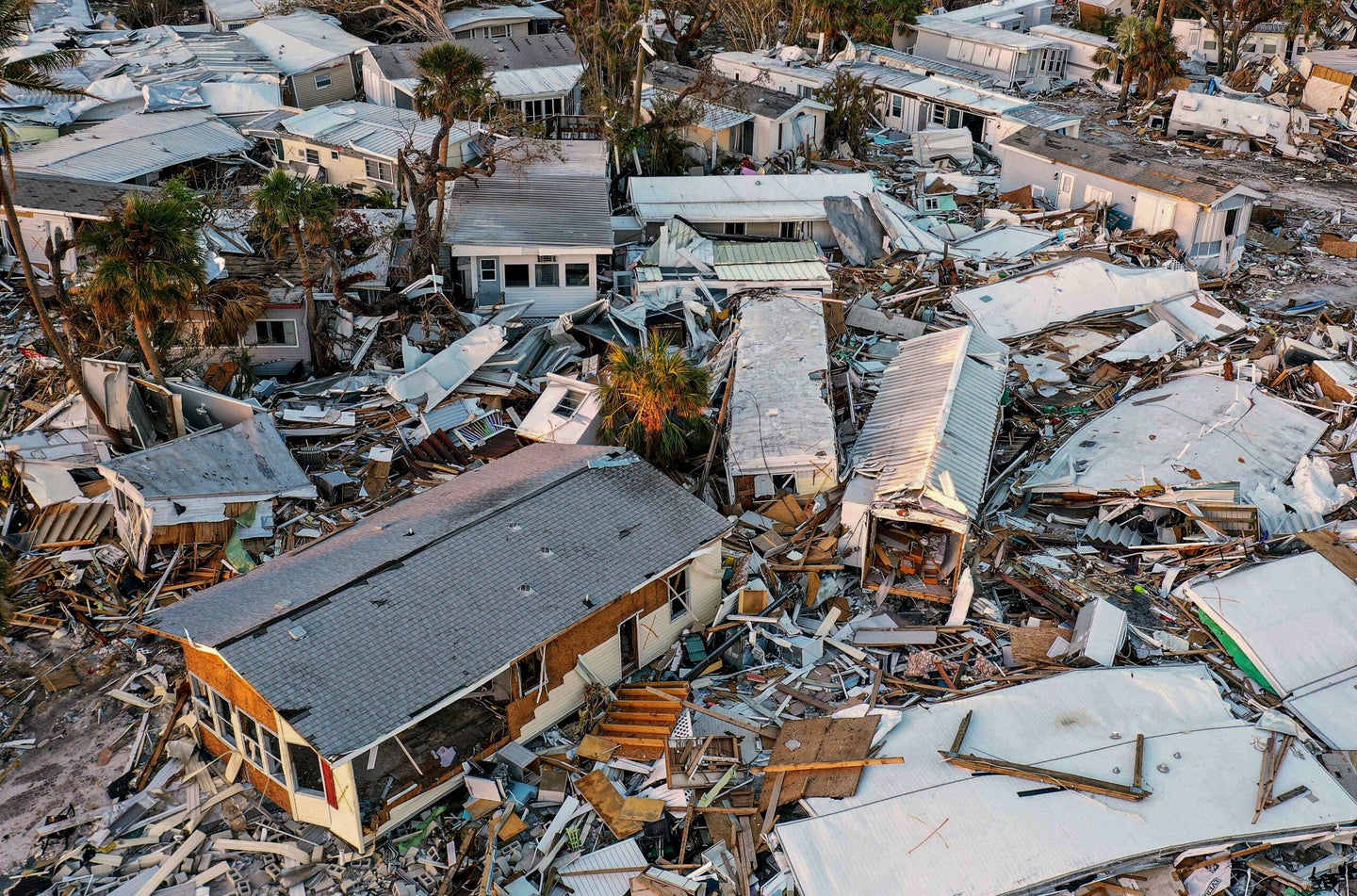 Heavily damaged mobile homes in Fort Myers Beach, Florida a month after Hurricane Ian made landfall on September 28 as a Category 4 hurricane.