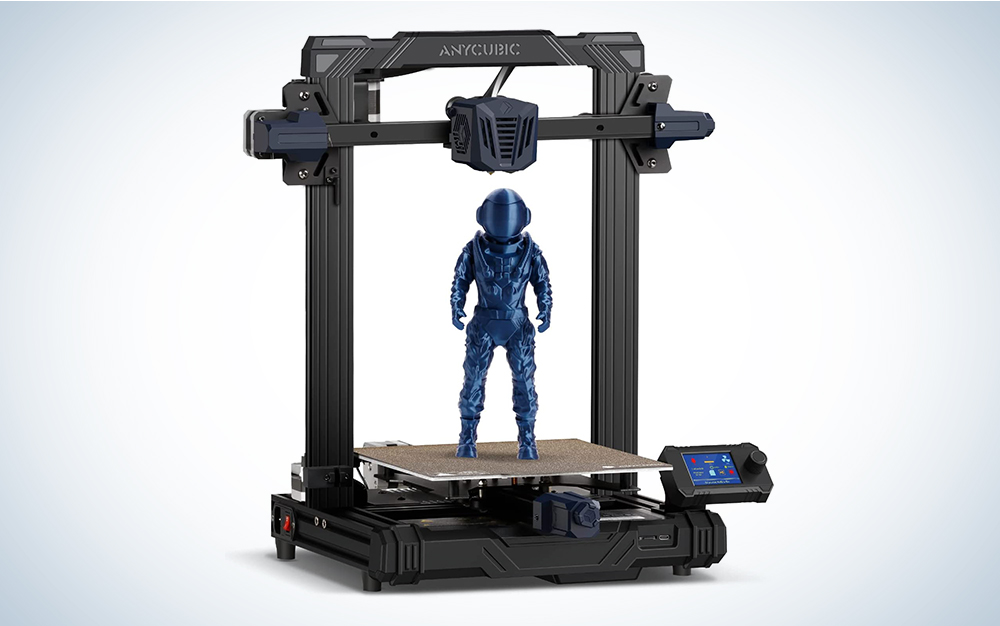 A 3D printer making an astronaut on a blue and white background