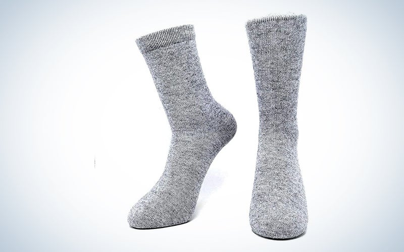 Gray cashmere socks on a blue and white background