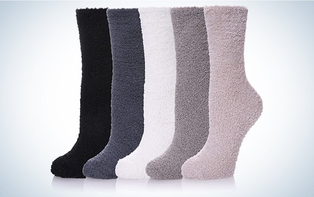 A lineup of fuzzy socks on a blue and white background