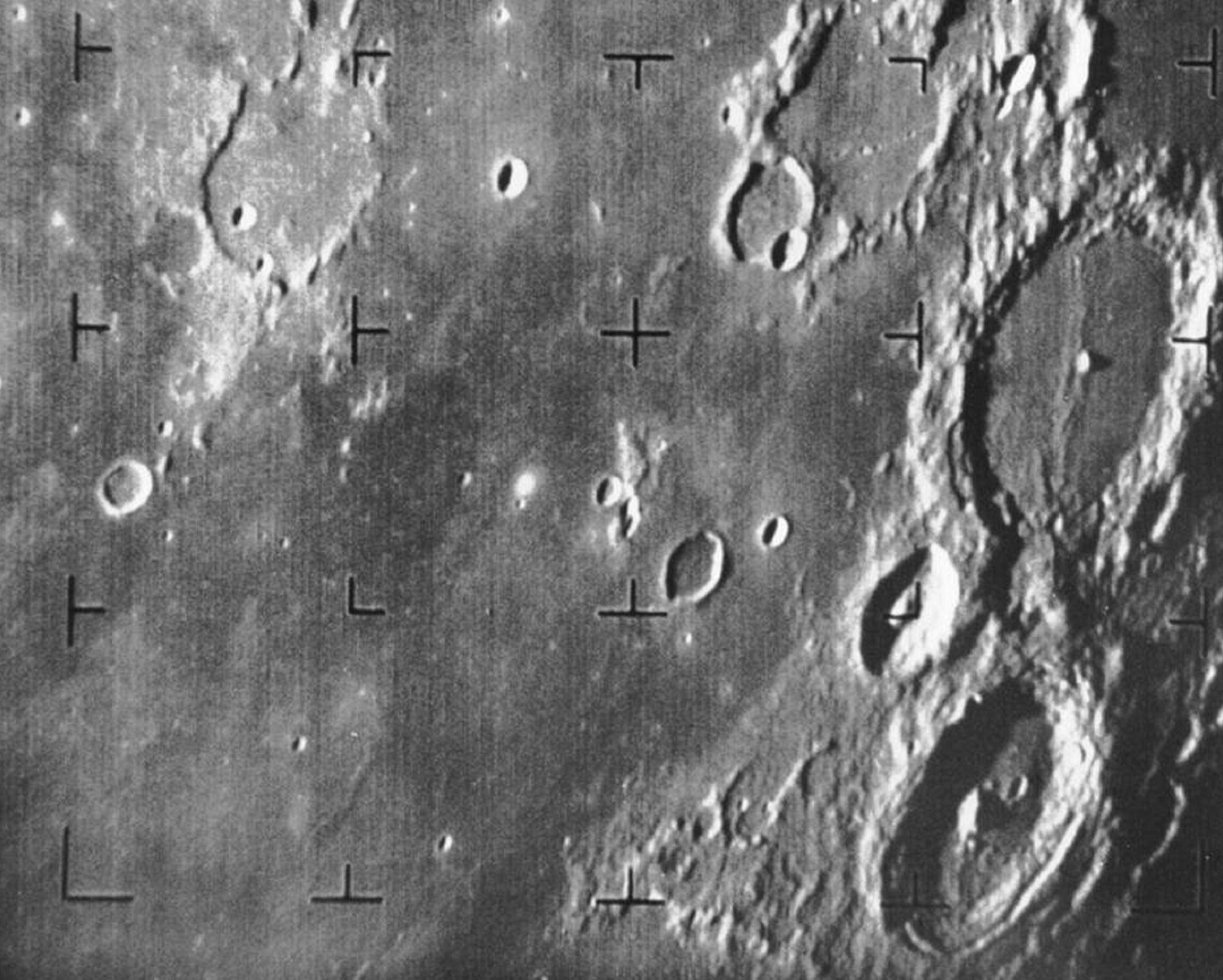 Moon craters in black and white image from Ranger 7 NASA space probe