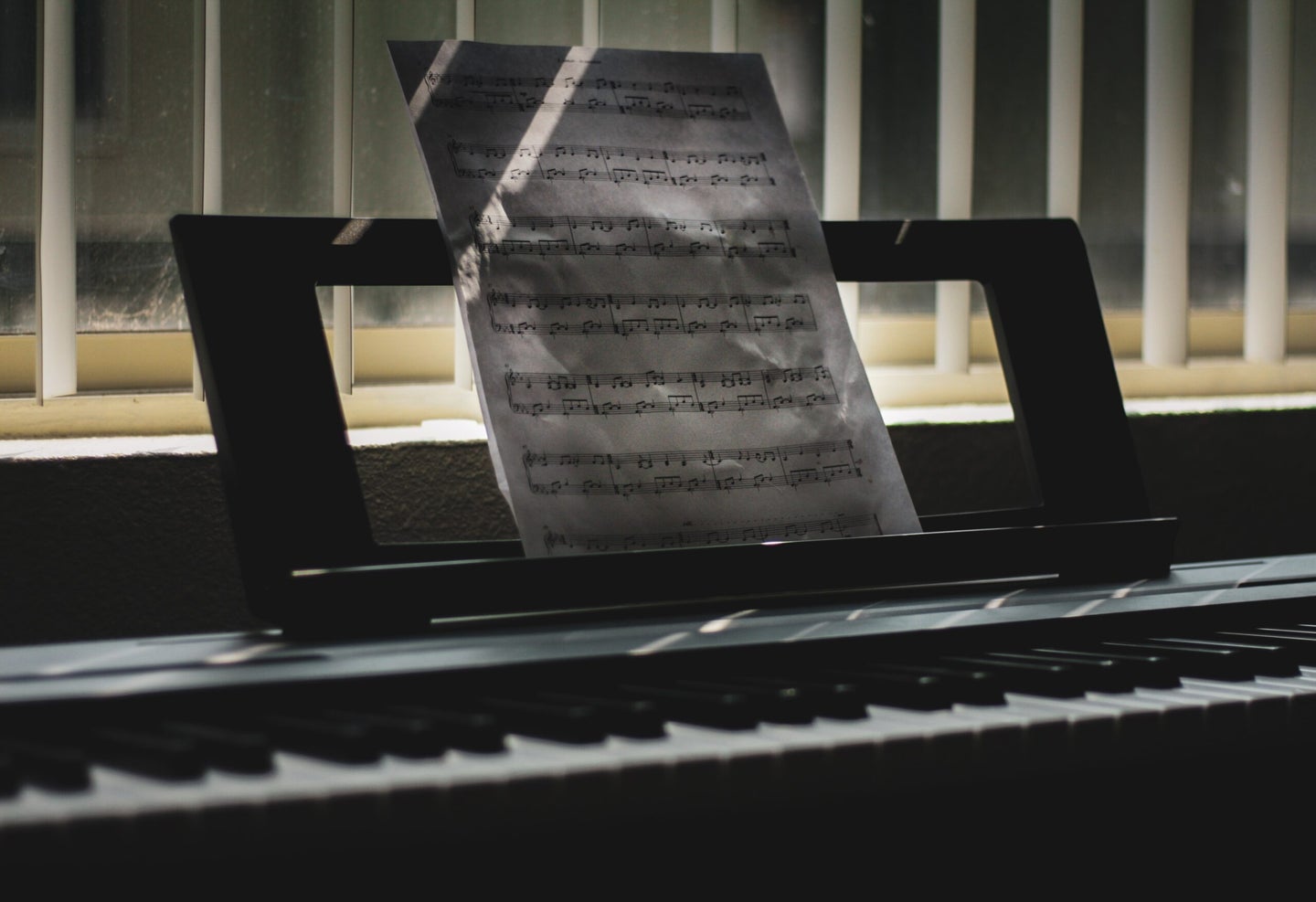 sheet music on piano