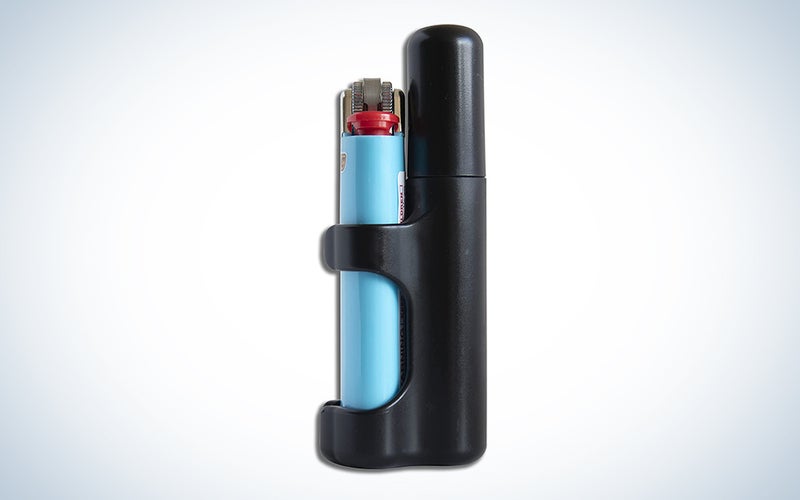 A Clinger lighter and joint holder on a blue and white background