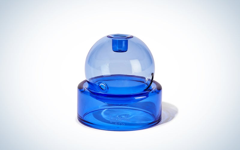 A blue Sackville & Co. Crystal Ball Pipe on a blue and white background