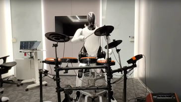 Watch this little drummer bot stay on beat
