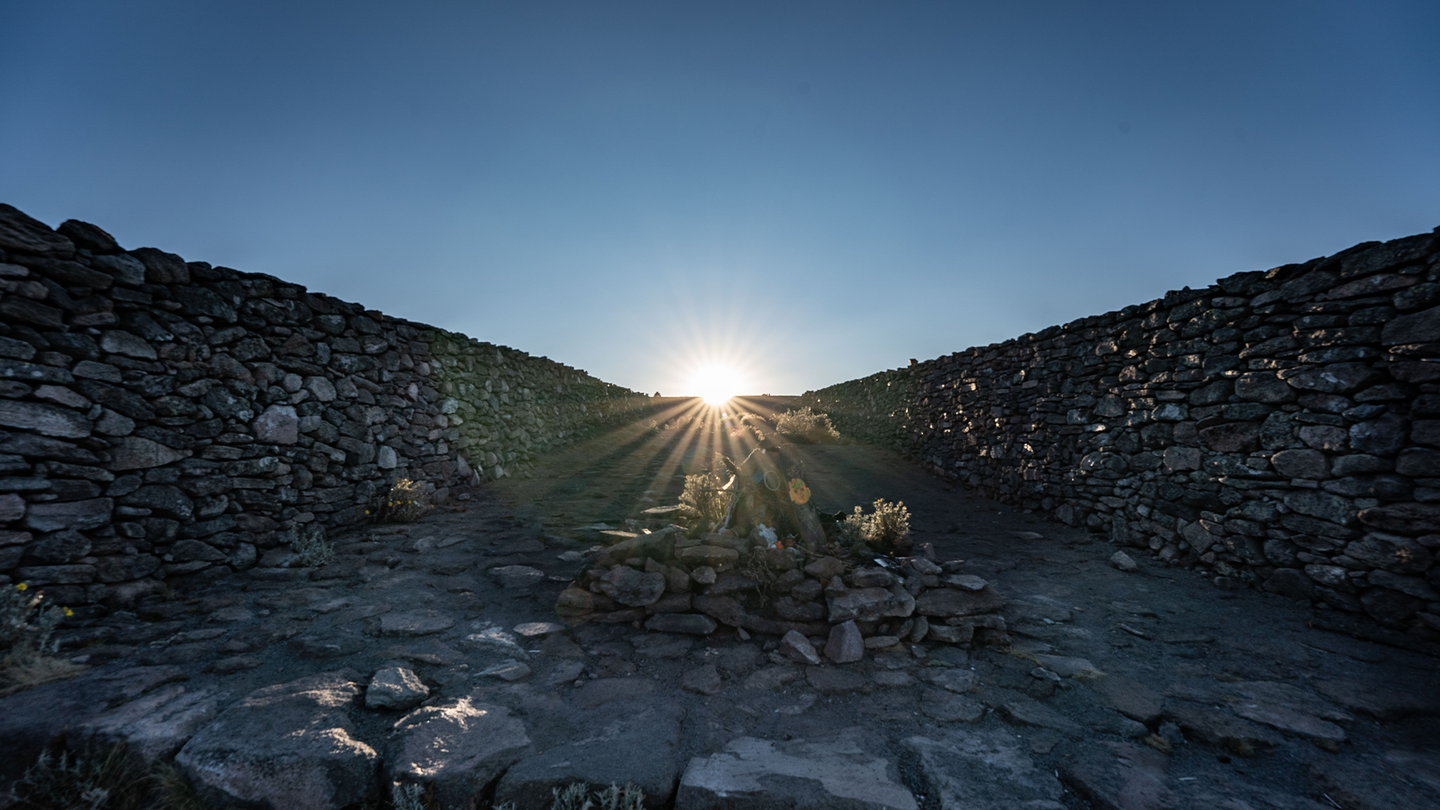 Rising sun viewed from the stone causeway of the solar observatory on Mount Tlaloc, Mexico.