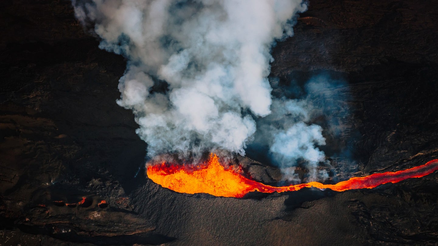 Lava erupts from the Mauna Loa Volcano on December 7, 2022 in Hilo, Hawaii.