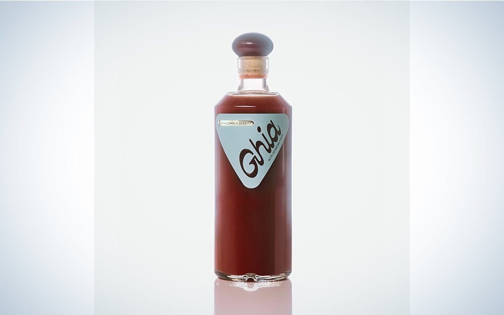 A bottle of Ghia on a blue and white background