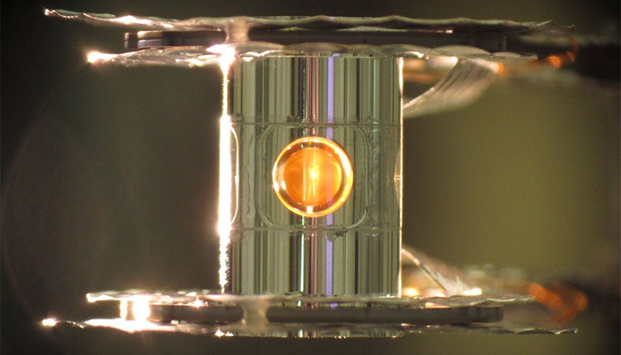 Nuclear fusion energy experiment fuel source in a tiny metal capsule