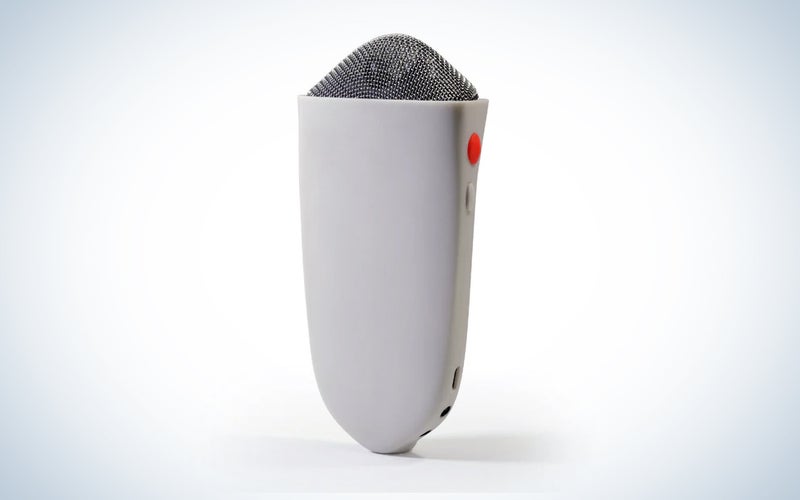 A gray blast mic on a blue and white background