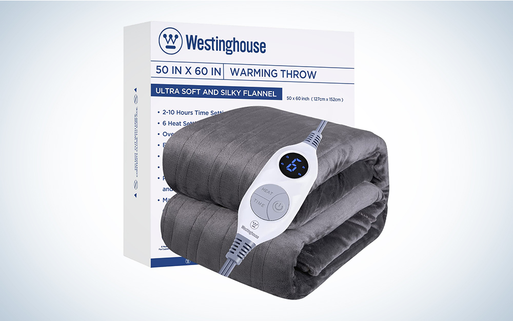 A gray westinghouse heated blanket on a blue and white background
