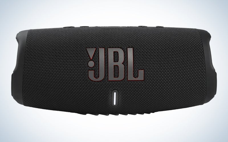A JBL Charge 5 on a blue and white background