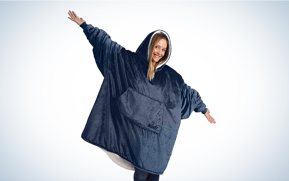A Comfy-brand blue wearable blanket on a blue and white background