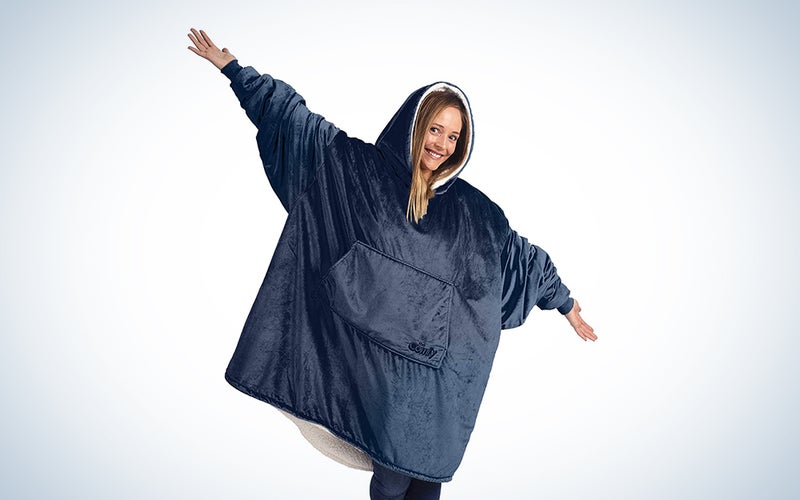 A Comfy-brand blue wearable blanket on a blue and white background
