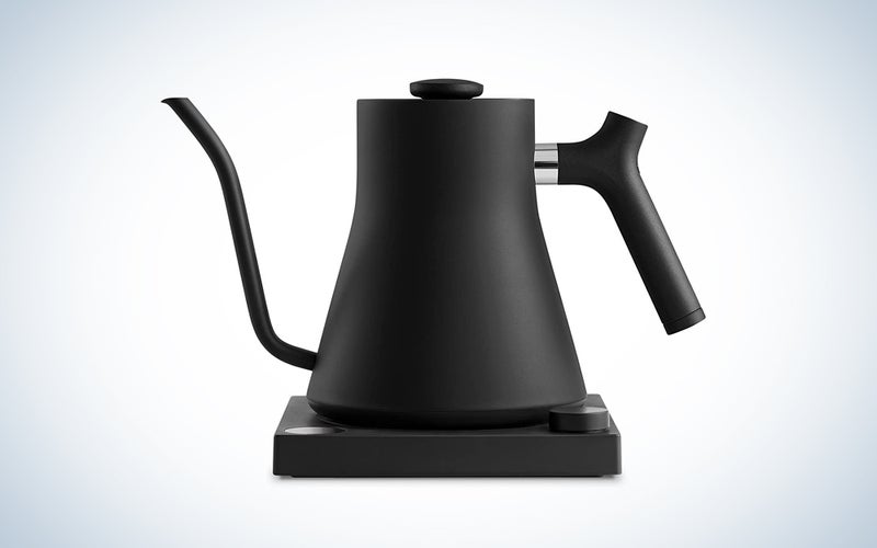 A black Fellow Stagg kettle on a blue and white background