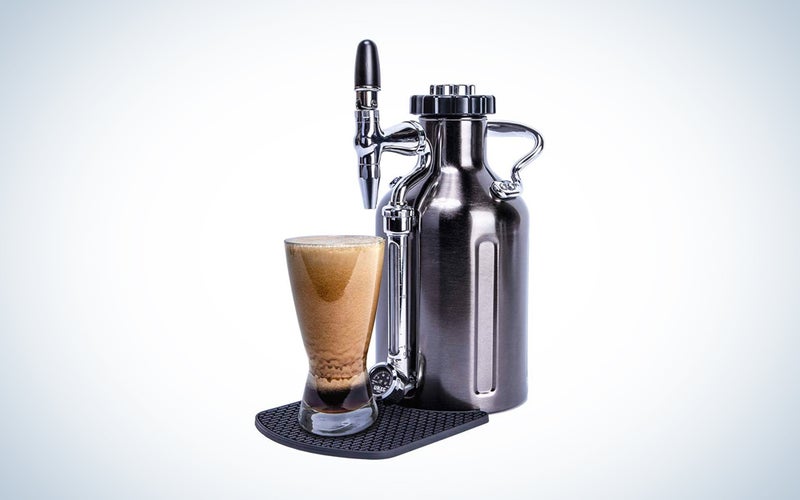 A GrowlerWerks nitro cold brew coffee maker on a blue and white background