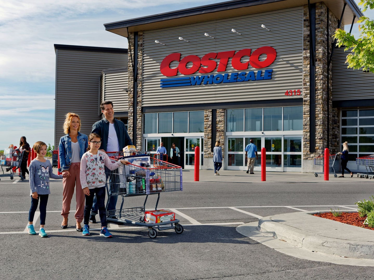 A family exiting a Costco