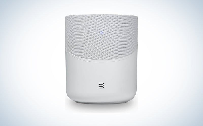 A Bluesound PULSE M speaker on a blue and white background