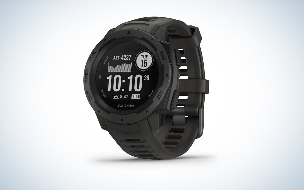 A Garmin Instinct 2 smart watch on a plain background.