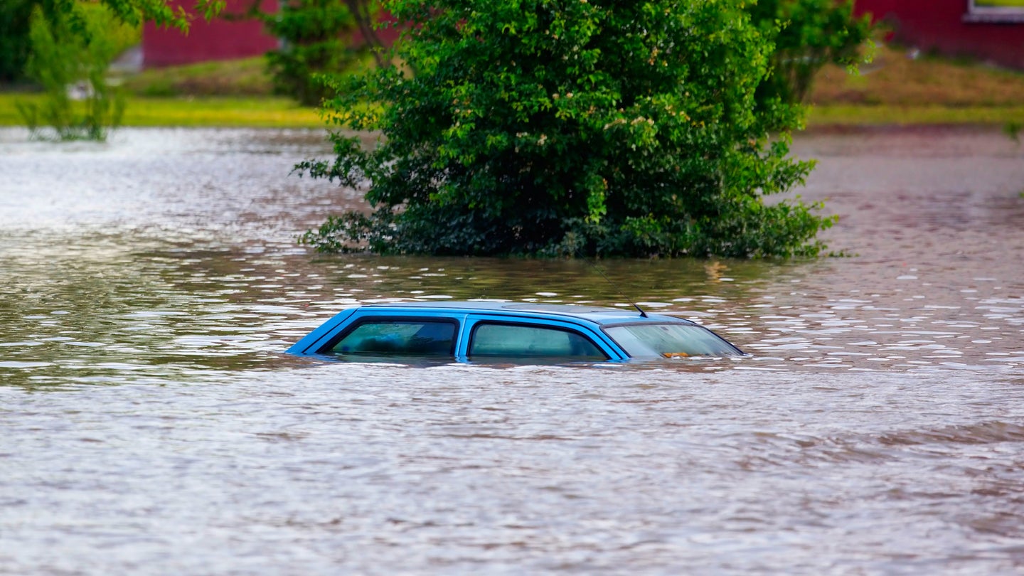 Car submerged in flooded street
