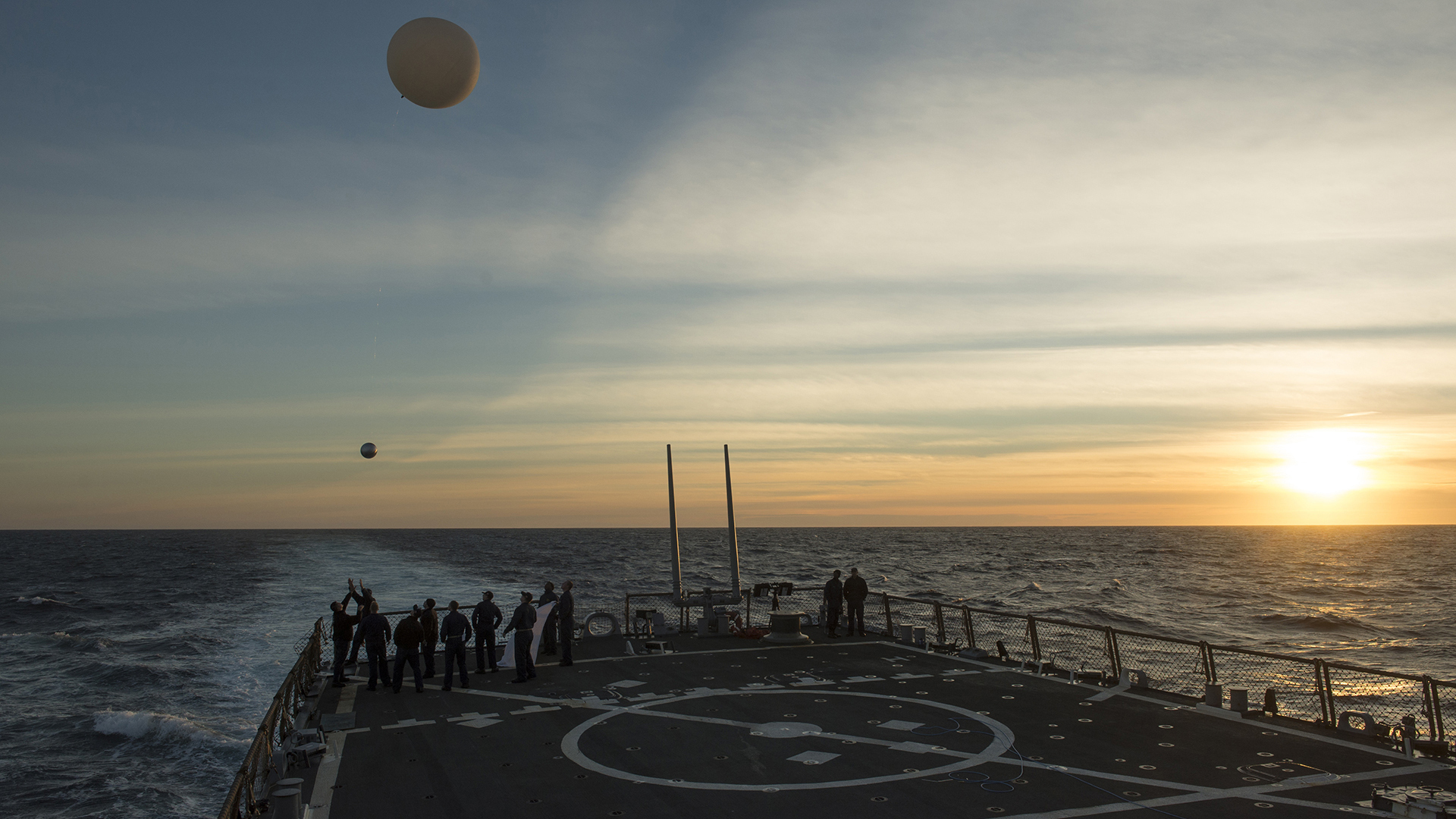 A weather balloon with a metal sphere below it was released from the guided-missile destroyer USS Donald Cook in January, 2014.