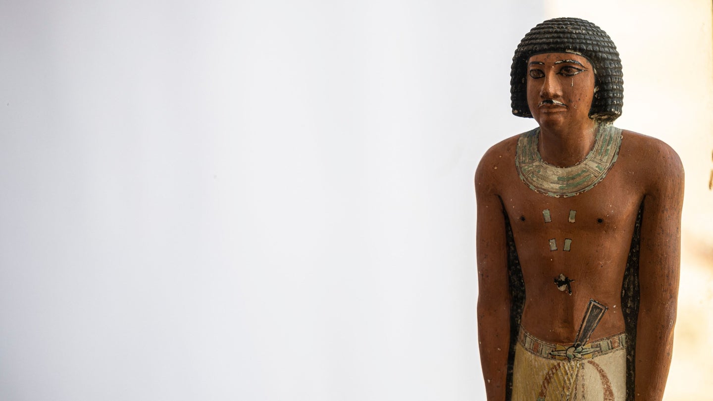 Am ancient Egyptian statue of a person with short hair from a recently discovered burial site.