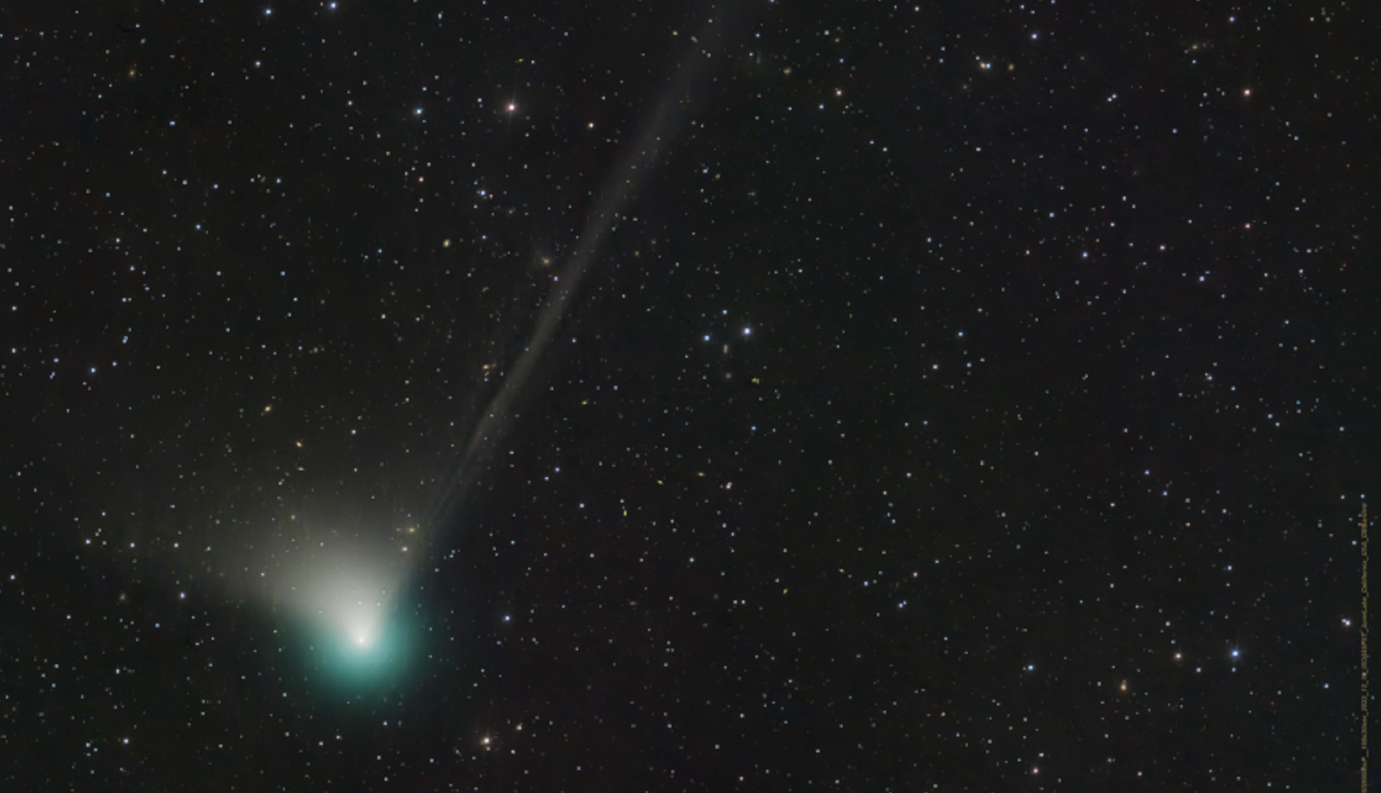 Green comet C/2022 E3 (ZTF) with tail in northern sky