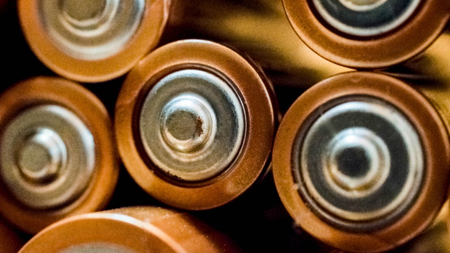 Close up to a stack of AA batteries