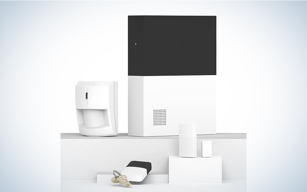 An Abode smart home security system on a blue and white background