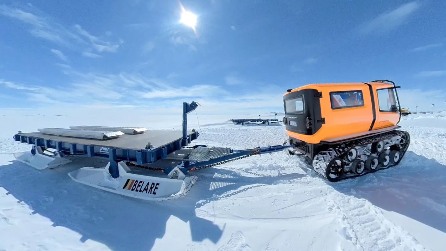 The Venturi Antarctica electric vehicle pulls a sledge through the snow