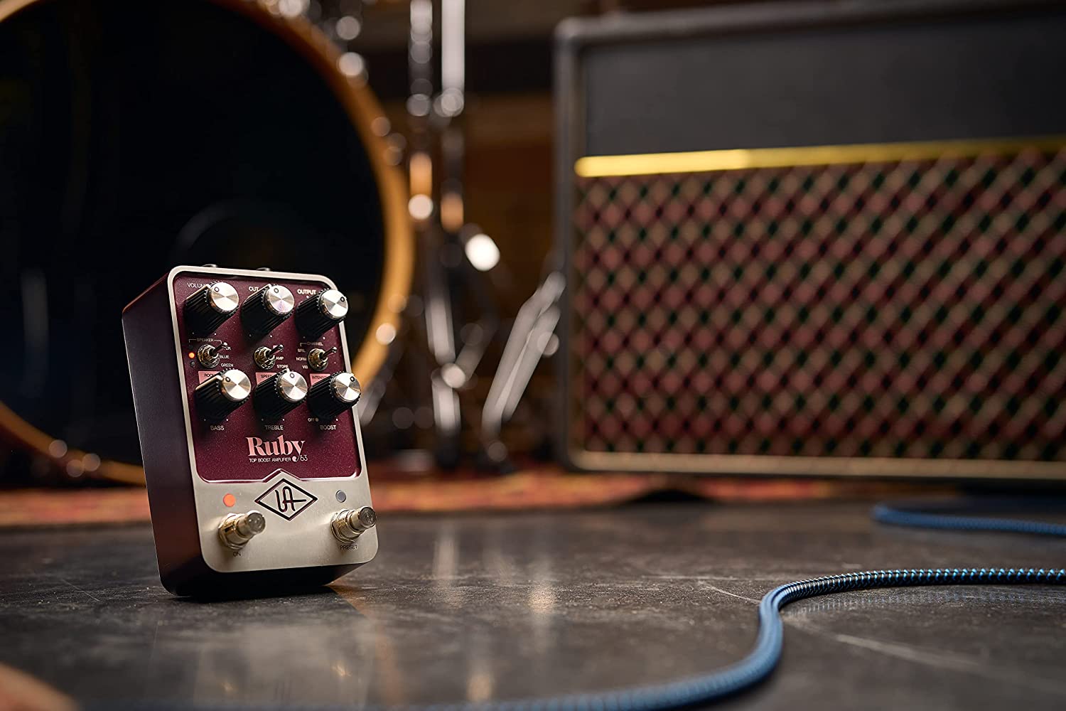 The Universal Audio Ruby guitar pedal sitting in front of the Vox AC30 amp it emulates
