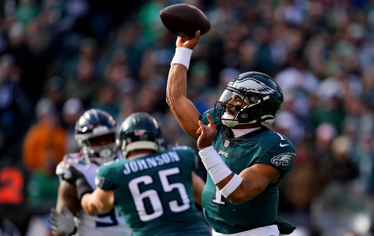 Super Bowl-qualifying Philadelphia Eagles quarterback Jalen Hurts throws a perfect football spiral