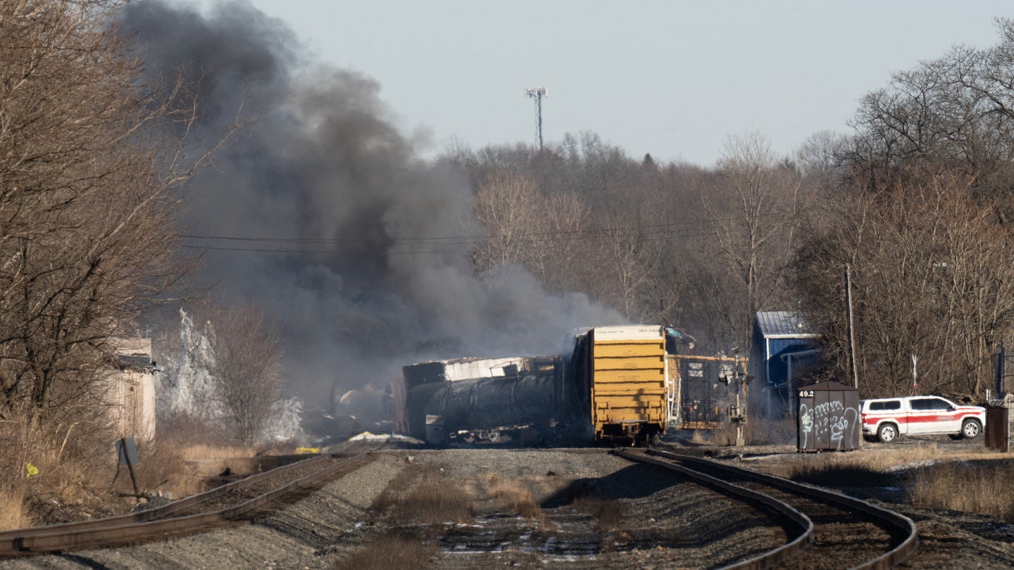 Smoke rises from a derailed cargo train in East Palestine, Ohio