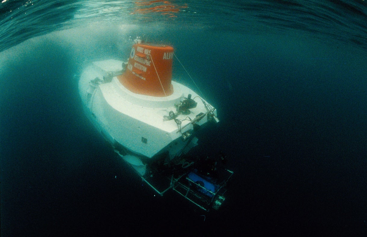 HOV Alvin, with ROV Jason Jr. attached, descends to the ocean bottom.