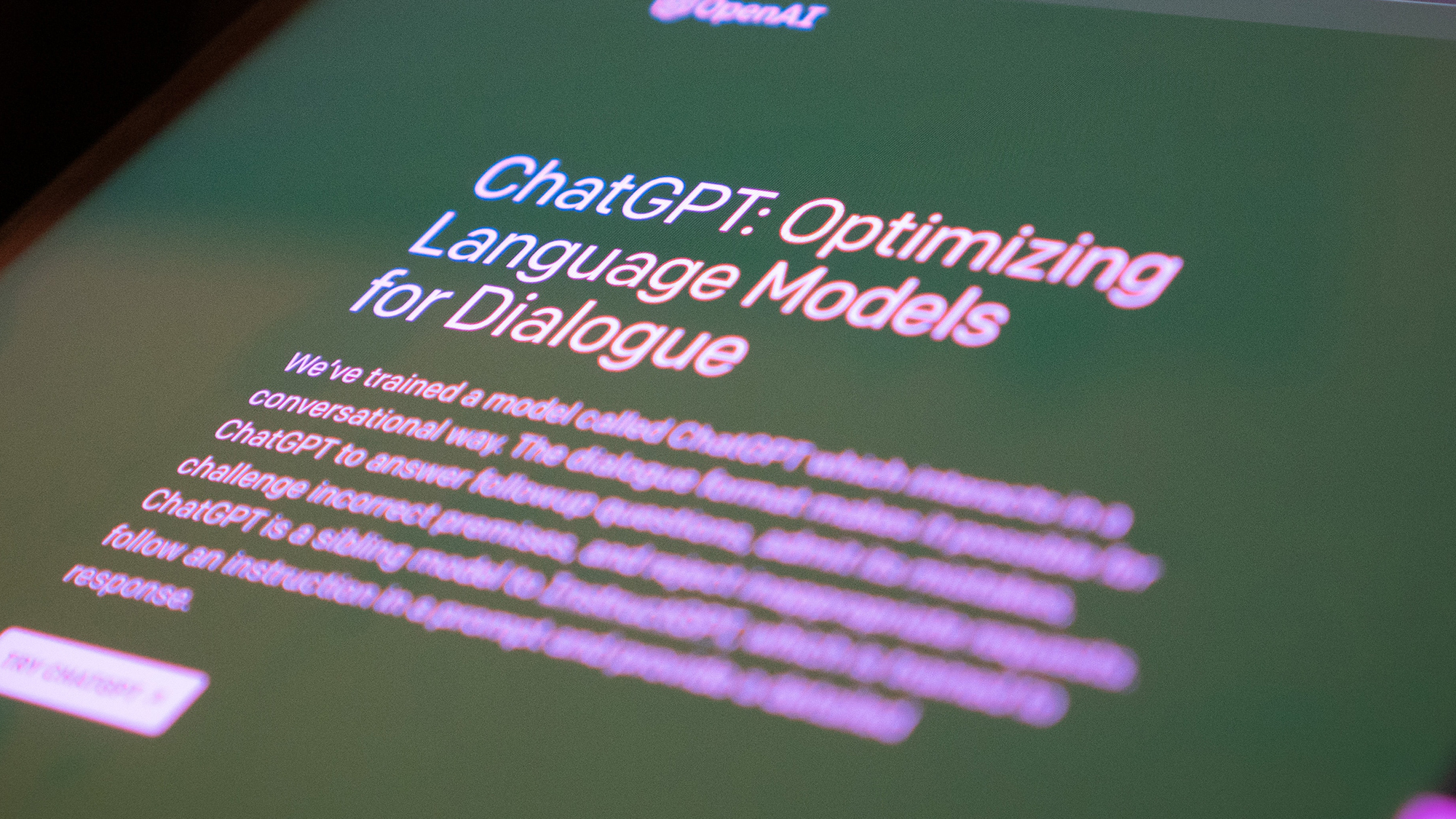 Close up to a screen showing the home page of ChatGPT