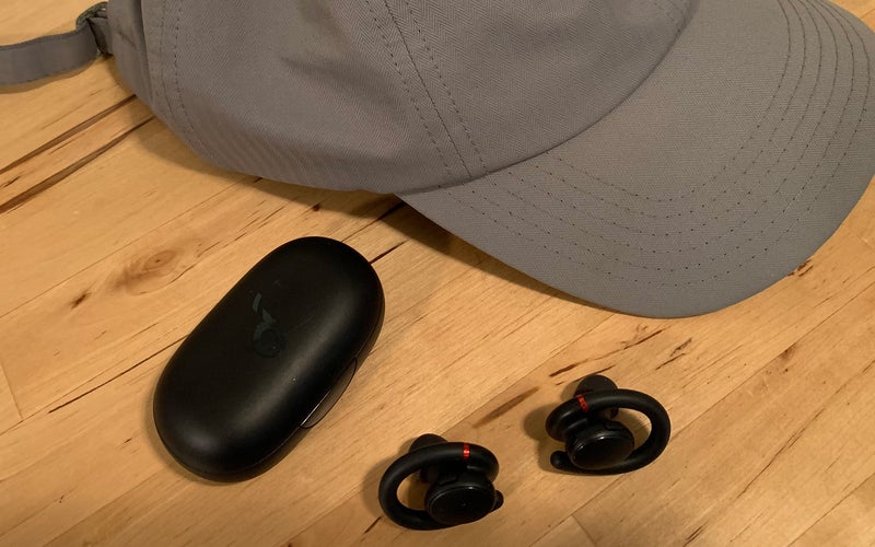 soundcore by Anker Sport X10 earbuds with a running hat